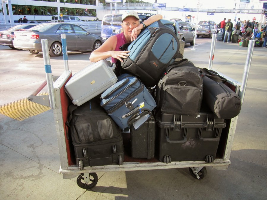 Annie with 7 bags of photographic equipment, and one tiny suitcase of personal items!