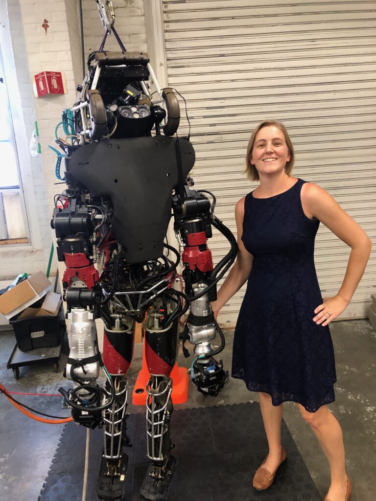 Kathryn-meeting-Atlas-the-robot-during-an-interview