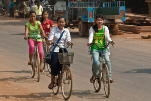 Cambodian-school-girls-riding-bicycles