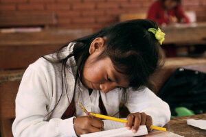 "Girl-in-a-classroom"-by-World-Bank-Photo-Collection-is-licensed-under-CC-BY-NC-ND-2.0.